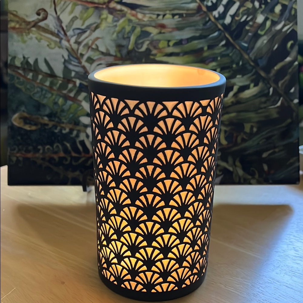 Elegant metal and porcelain Candle Holder
